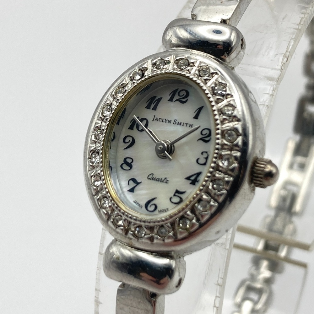 Jaclyn Smith Womens Watch 19mm Silver Tone Crystals MOP Dial Oval New Battery 7"